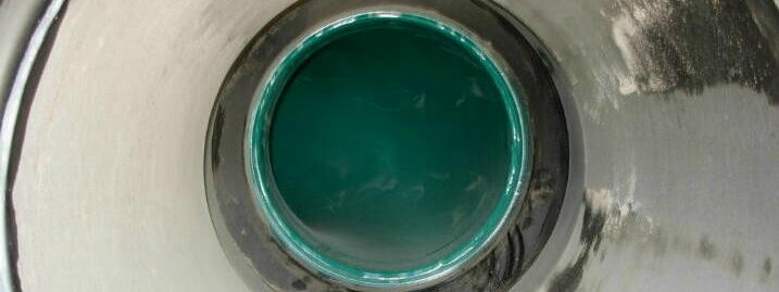 Detailed shot of the interior of a pump pipe, focusing on the smooth curve and material.